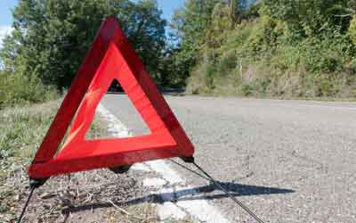 a warning triangle on the road
